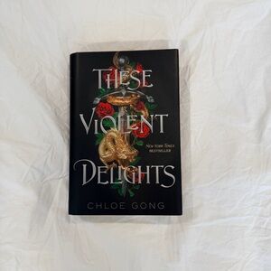 Indigo 'These Violent Delights' Black Hardcover Book